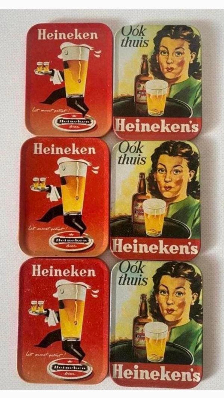6 Metalen onderzetters van Heineken met achterkant van kurk, Glasonderzetter, Metaal, Ophalen of Verzenden, Zo goed als nieuw