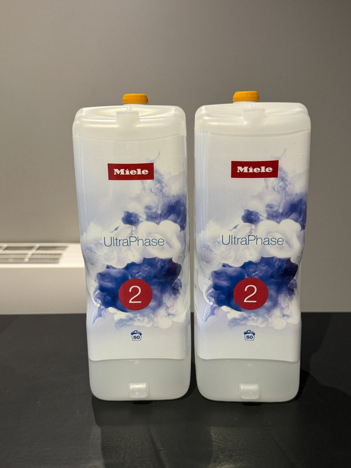 2x Miele UltraPhase 2 wasmiddel, Huis en Inrichting, Schoonmaakartikelen, Ophalen of Verzenden, Schoonmaakmiddel