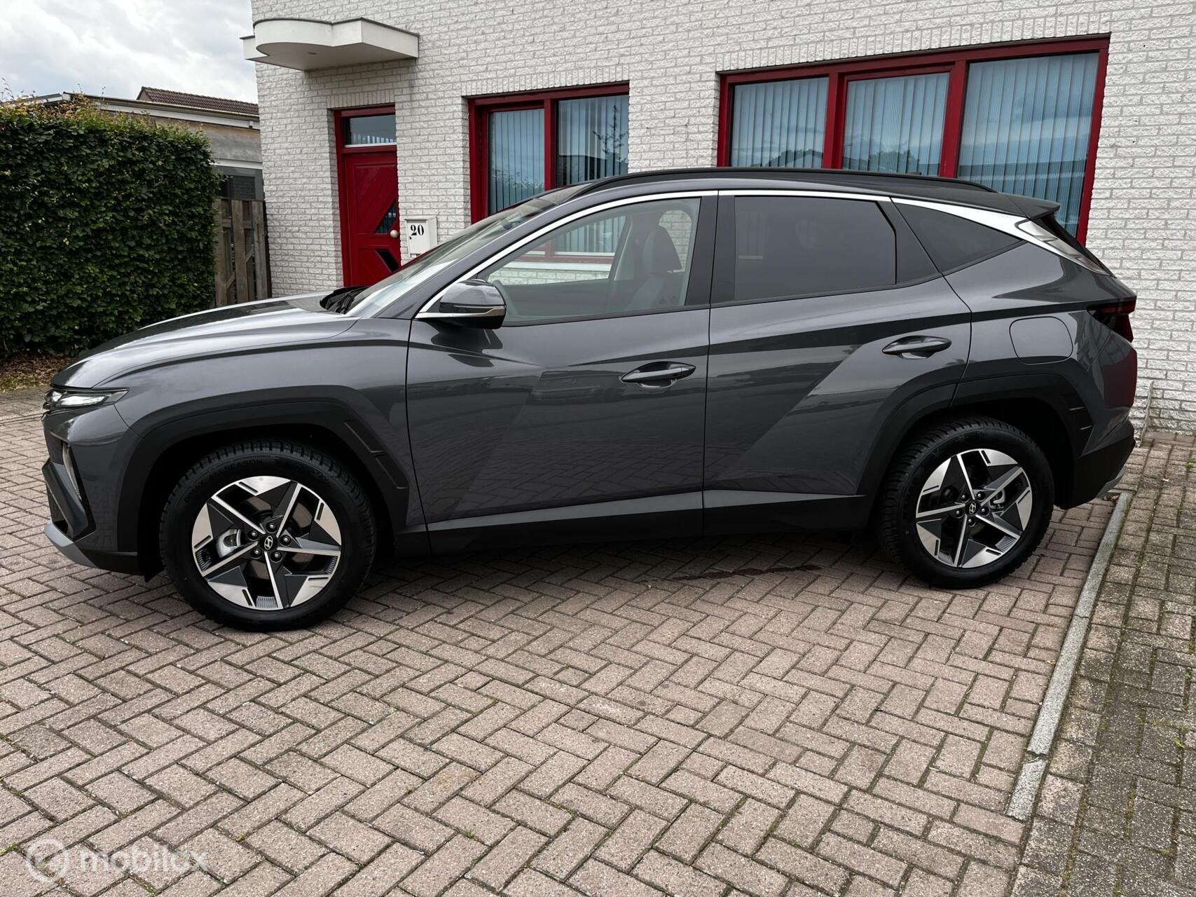 Hyundai Tucson 1.6 T-GDI MHEV Comfort, Auto's, Hyundai, Stof, Gebruikt, Zwart, 4 cilinders