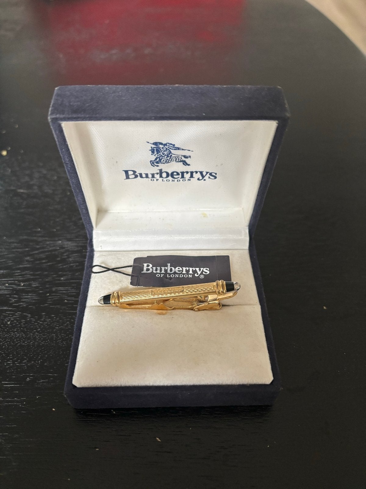 Vintage Burberrys dasspeld goudkleurig met originele doos, Ophalen of Verzenden, Gebruikt