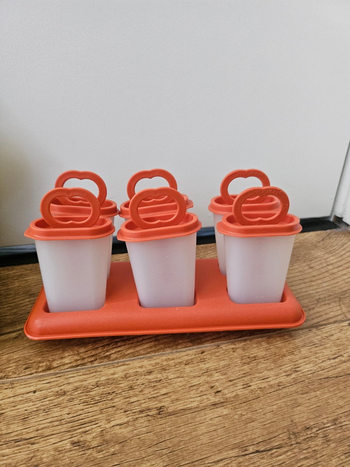 Tupperware ijsjes maker set doorzichtig oranje €10,00, Gebruikt, Overige typen, Oranje, Ophalen of Verzenden