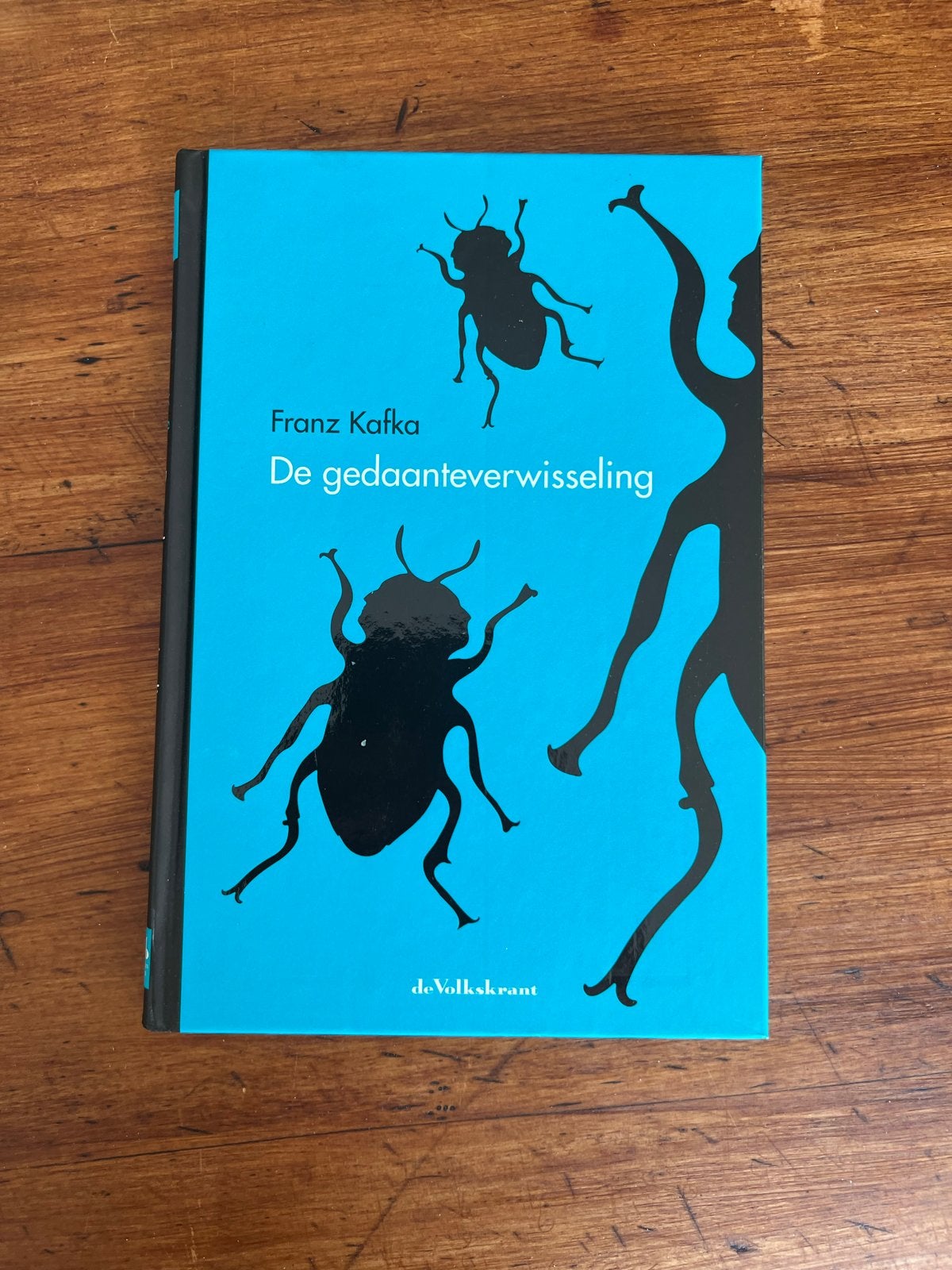 De gedaanteverwisseling - Franz Kafka (De Volkskrant), Ophalen of Verzenden, Zo goed als nieuw, Nederland