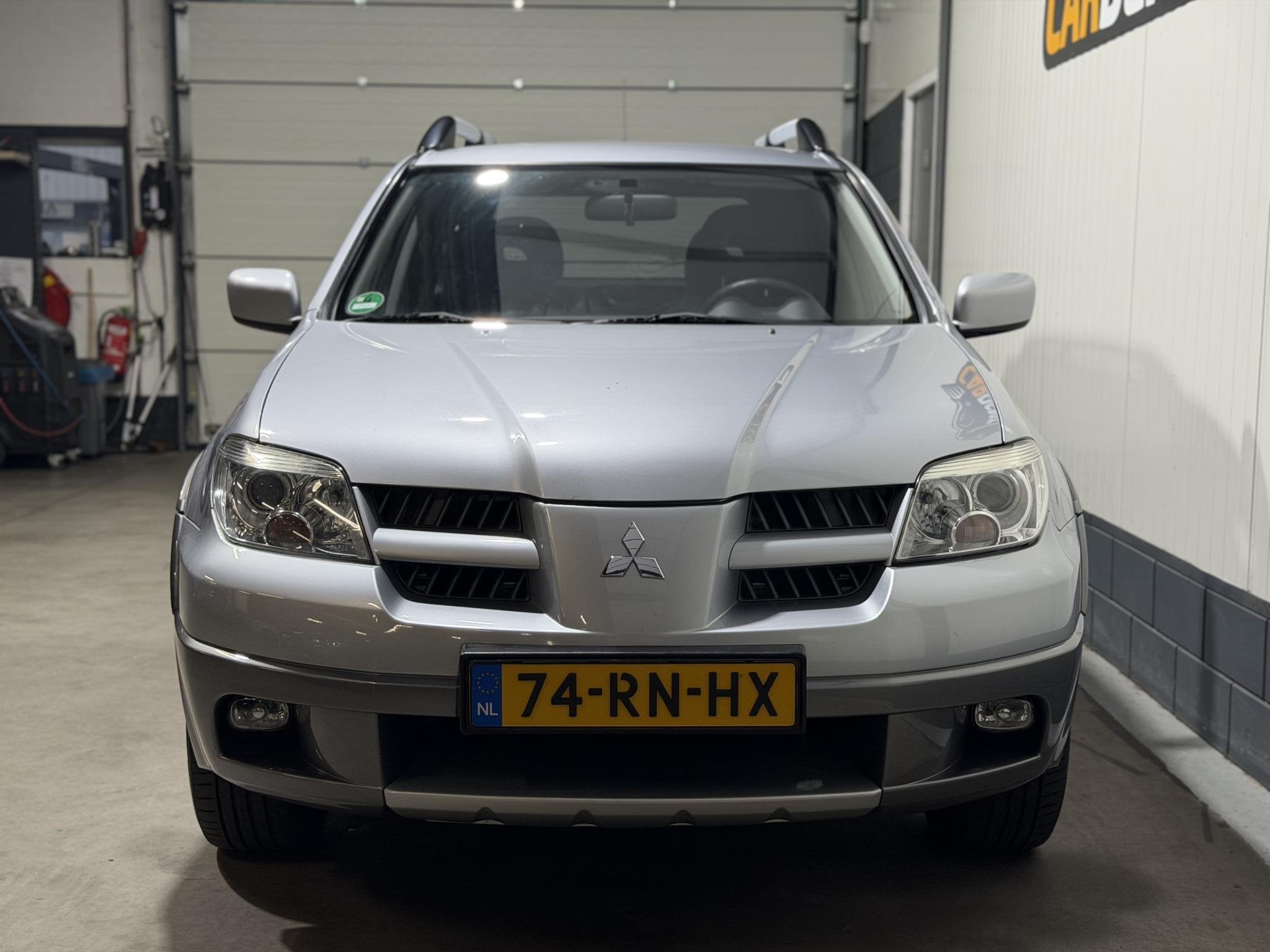 Mitsubishi Outlander 2.4 Intense 4WD Technisch Super Trekhaa, Auto's, Automaat, Stof, 4 cilinders, 160 pk