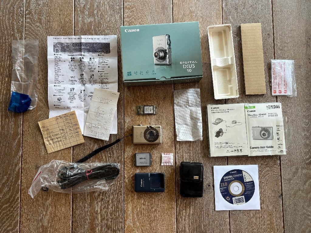 Canon Ixus 50 in nieuwstaat met vele extra's, Audio, Tv en Foto, Fotocamera's Digitaal, Canon, Ophalen of Verzenden, Zo goed als nieuw