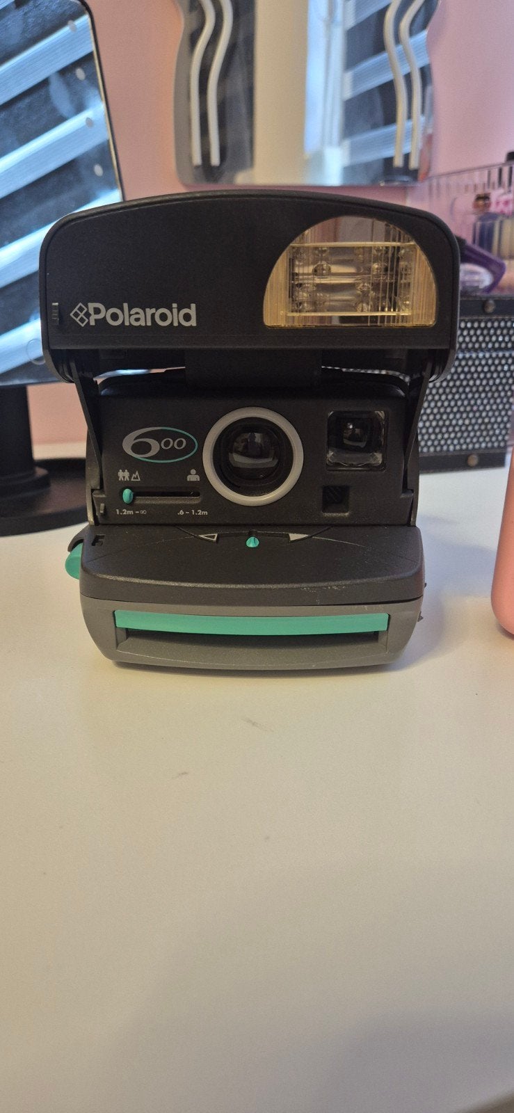 Diverse Polaroid camera's en roze kindercamera, Ophalen