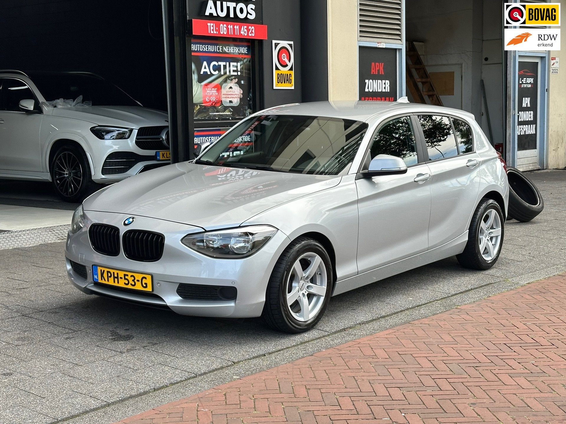 BMW 1-serie 116i Business Automaat Navi Clima PDC, Auto's, Euro 5, Gebruikt, 650 kg, 1285 kg