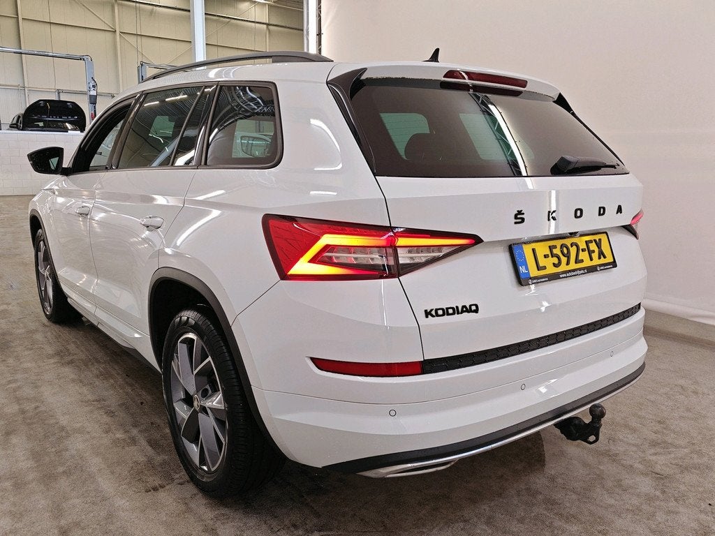 Skoda Kodiaq 1.5 TSI 150pk Automaat Sportline Business 5P |, Auto's, Skoda, 4 cilinders, Wit, Origineel Nederlands, Bedrijf