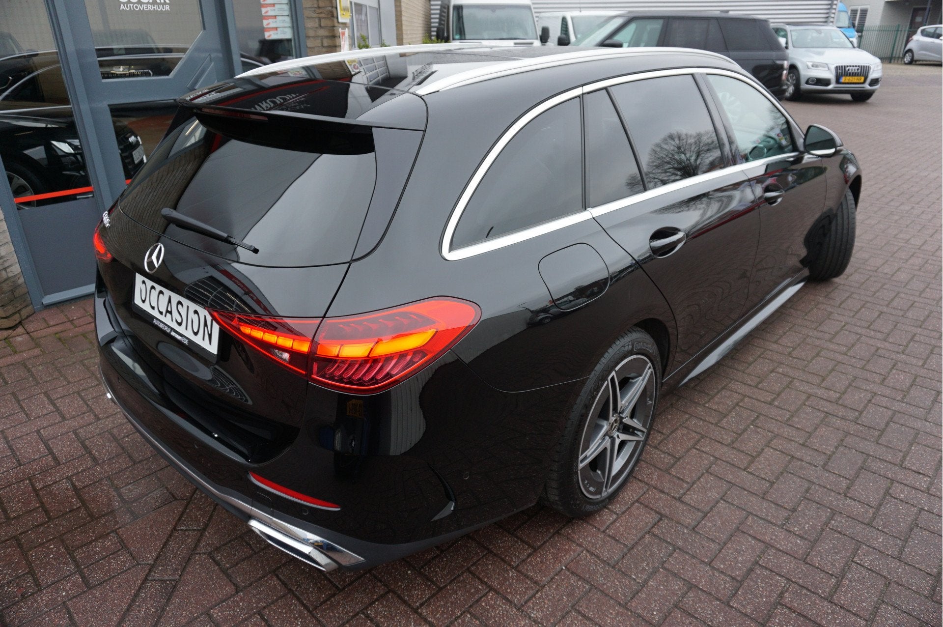 Mercedes-Benz C-Klasse Estate 300 e AMG Line (bj 2022), Dealer onderhouden, Achterwielaandrijving, Zwart, 4 cilinders