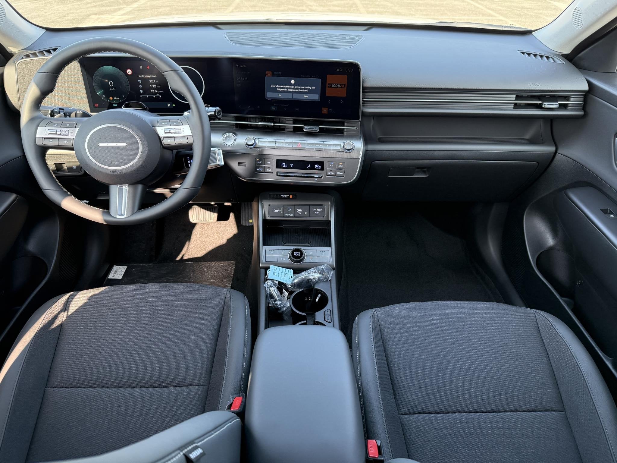 Hyundai Kona 1.6 GDI HEV Comfort Plus / €4.000,- Voordeel, Auto's, Hyundai, 137 pk, Lichtsensor, Euro 6, Leder en Stof