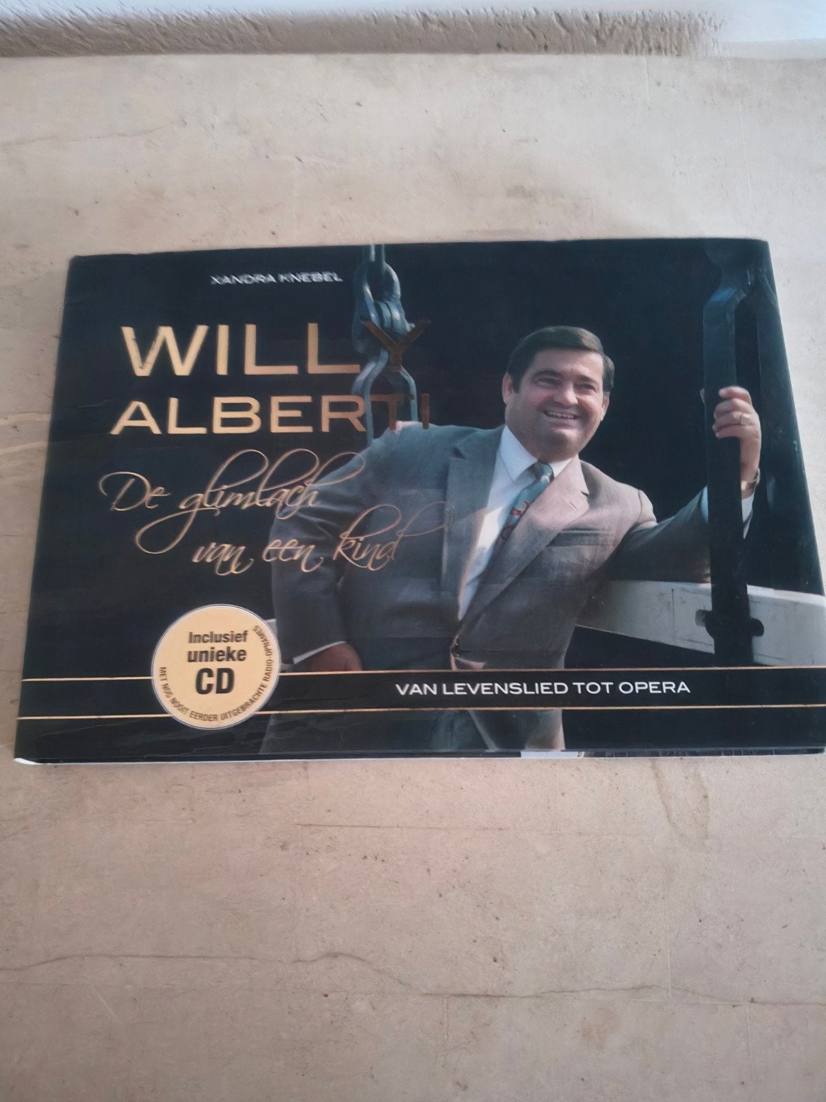 Willy Albert: De glimlach van een kind (incl. CD), Boeken, Ophalen, Zo goed als nieuw, Artiest, Sandra Knebel
