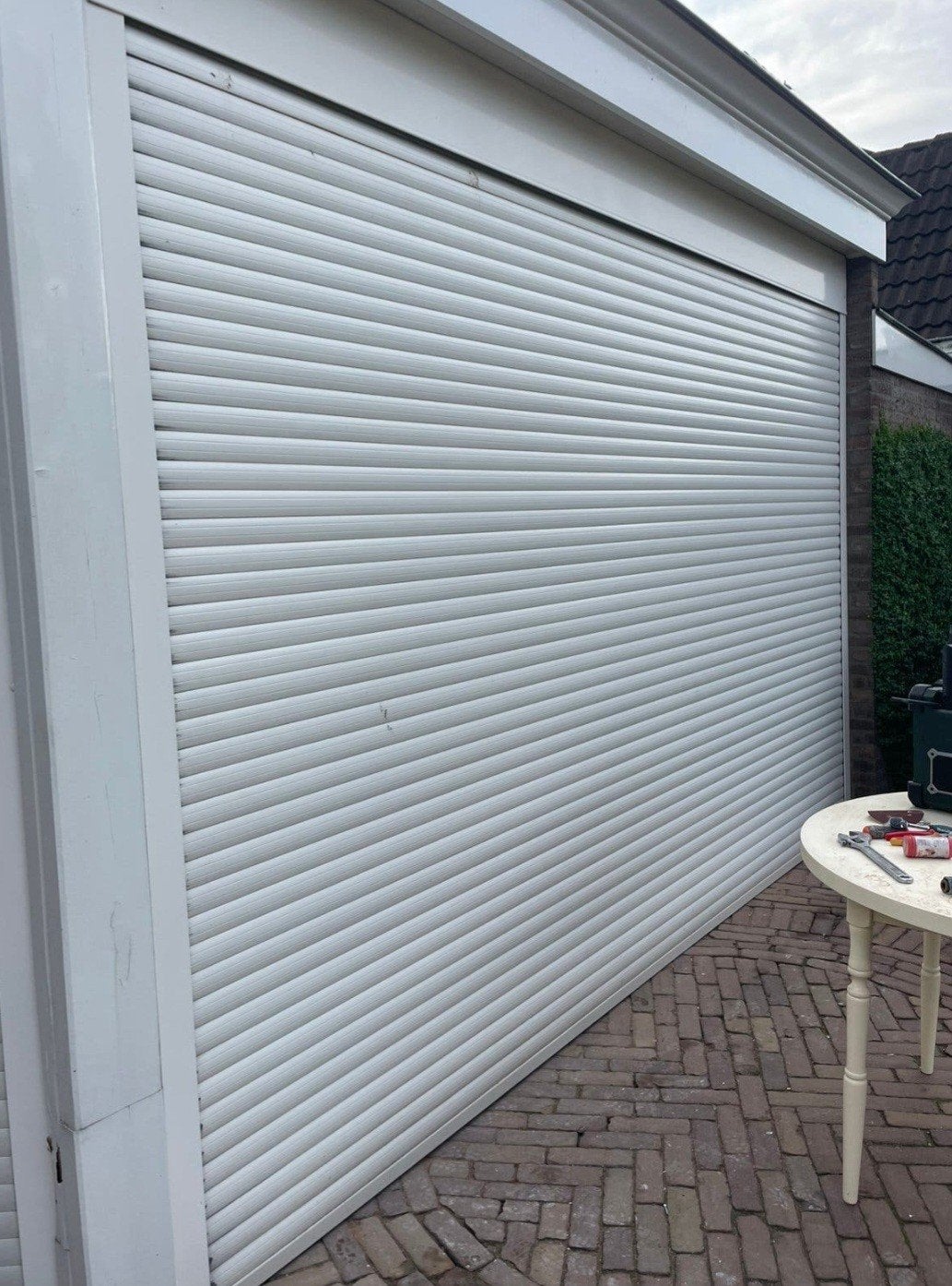 Tekoop elektrische rolluik garage rol deur
is geschikt voor, Ophalen, 200 cm of meer, Zo goed als nieuw, 200 cm of meer