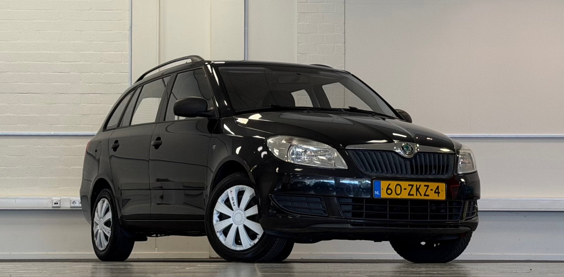 Skoda Fabia Combi 1.2 TSI Arctic Trekhaak Airco 3e Eigenaar, Voorwielaandrijving, Euro 5, Zwart, 4 cilinders