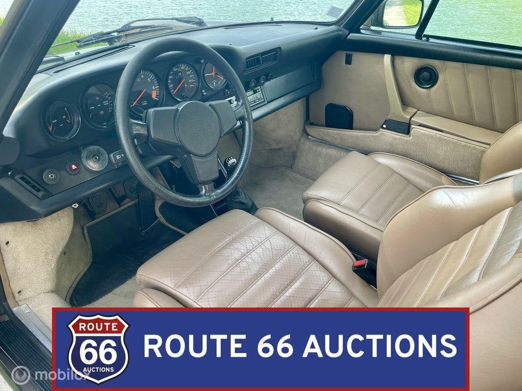 Porsche 911 Carrera 3.2 Cabriolet | 1984 | Route 66 Auctions, Auto's, Oldtimers, Overige carrosserieën, Zwart, Bedrijf, Porsche