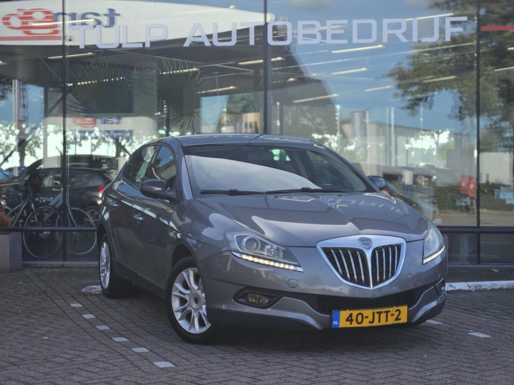 Lancia Delta 1.4-16V Argento Nette staat! Airco Clima Trekha, Auto's, Stof, Gebruikt, 4 cilinders, Origineel Nederlands