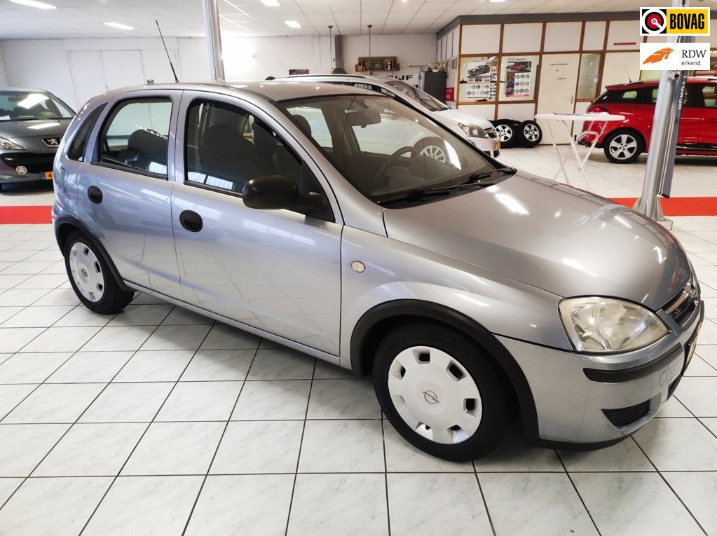 Opel Corsa 1.2-16V Essentia 5 drs.airco- audio-electric pakk, Auto's, Voorwielaandrijving, Dealer onderhouden, Gebruikt, Zwart