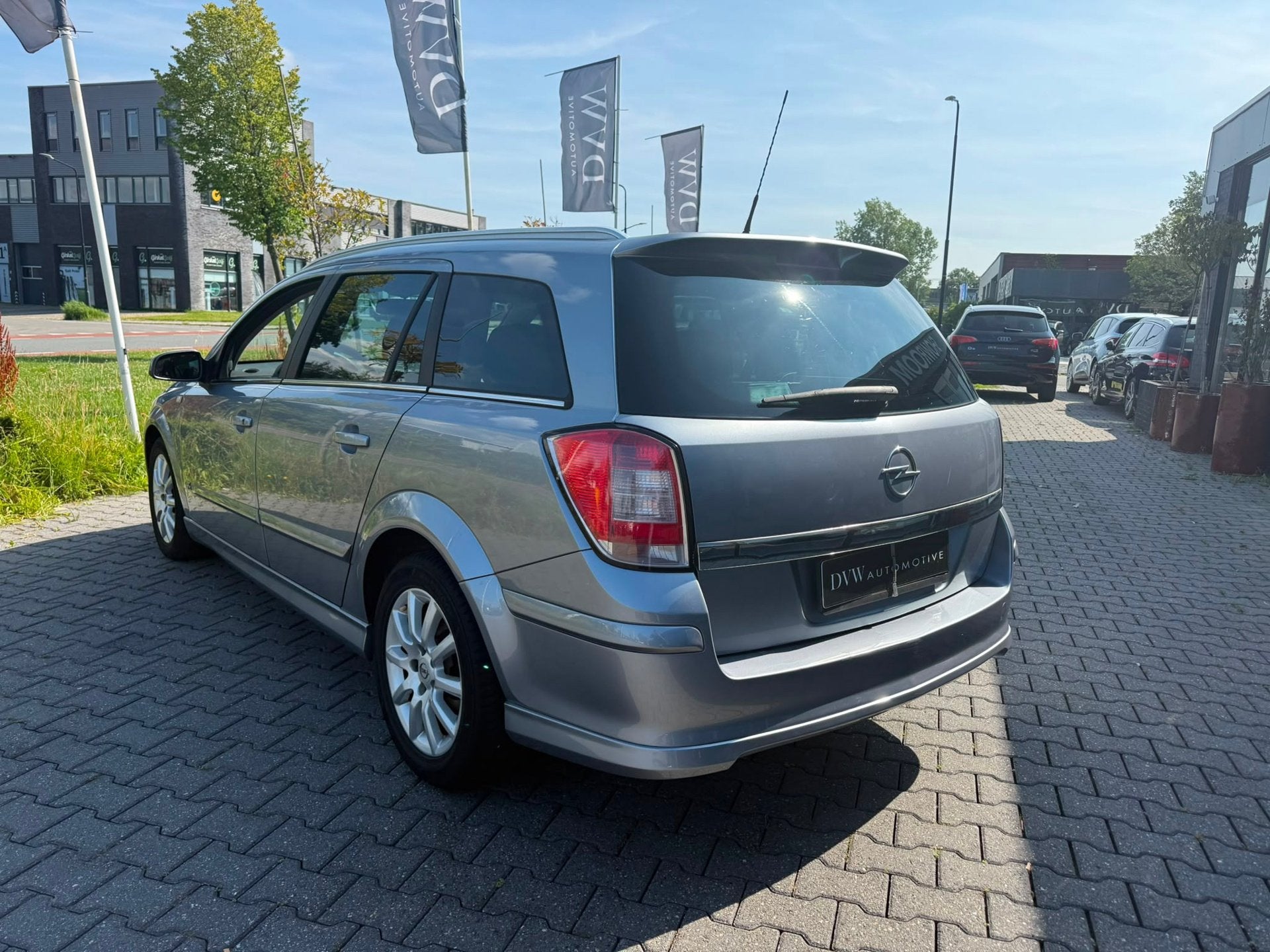 Opel Astra Wagon 1.6 Temptation OPC Line Automaat, Stof, Gebruikt, 4 cilinders, 116 pk