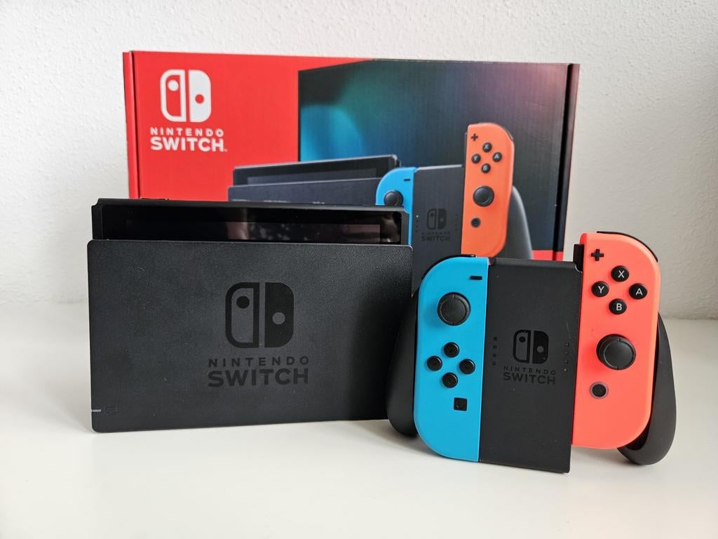 Nintendo Switch met Neon Joy-Cons en originele doos, Spelcomputers en Games, Spelcomputers | Nintendo Switch, Ophalen, Zo goed als nieuw