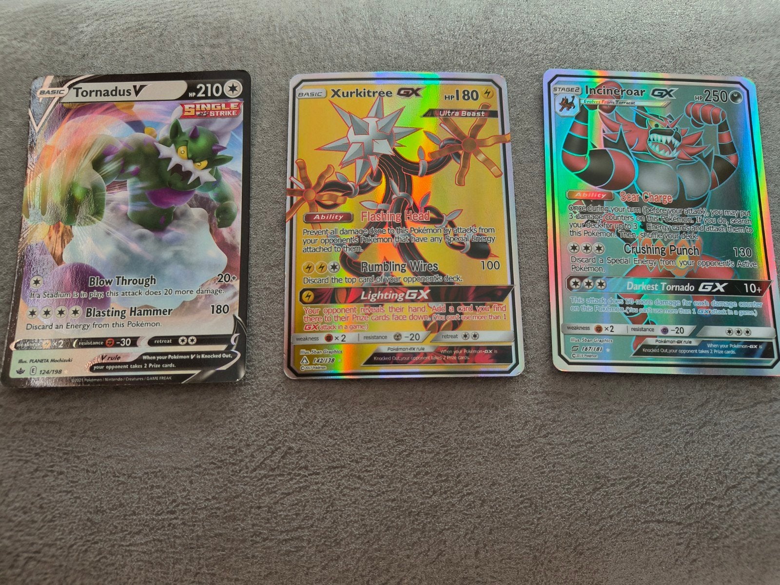 3 Pokémon kaarten - Tornadus V, Incineroar GX, Xurkitree GX, Hobby en Vrije tijd, Verzamelkaartspellen | Pokémon, Zo goed als nieuw