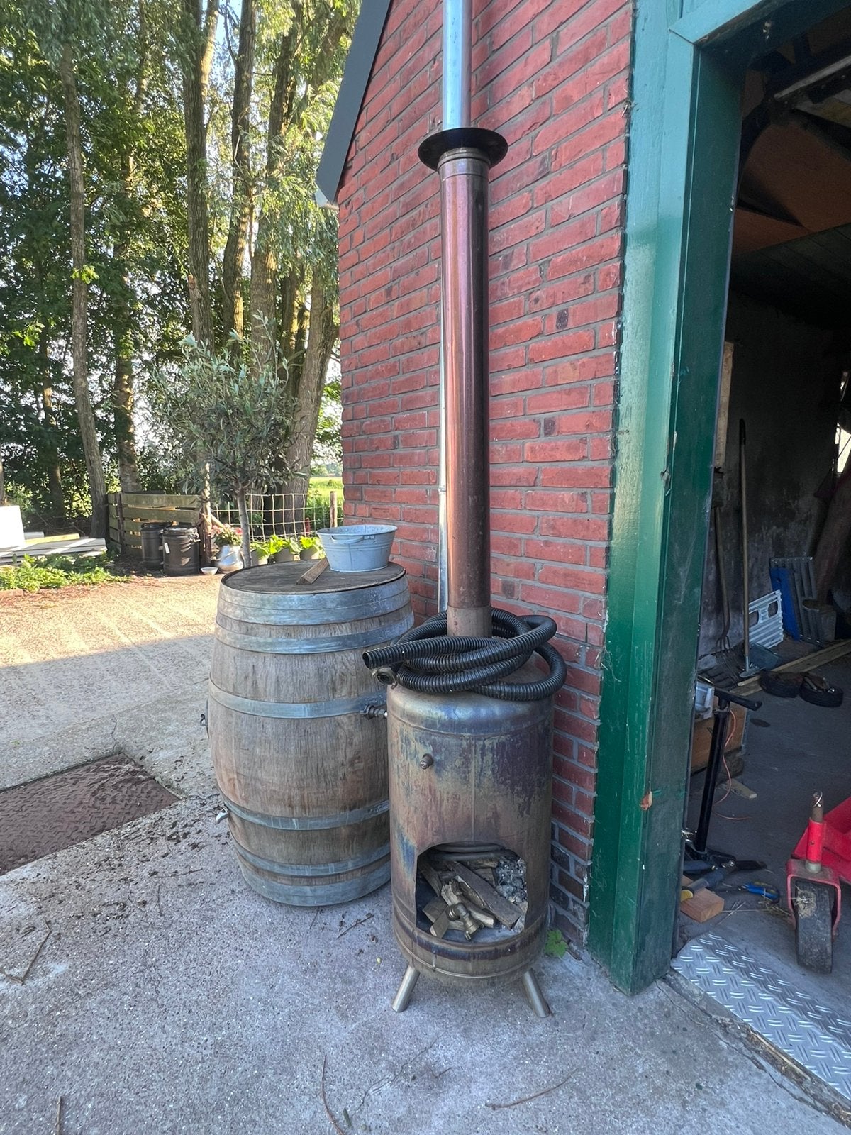 Rvs houtkachel met warmtewisselaar, Ophalen of Verzenden, Zo goed als nieuw
