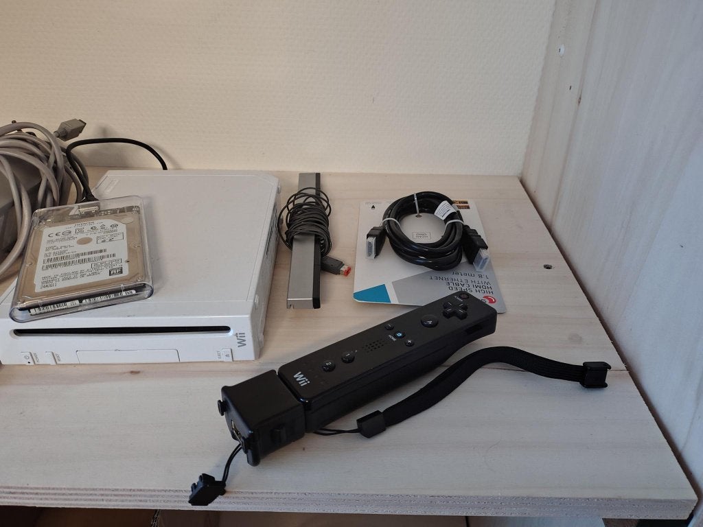 Wii console set met accessoires en games, Ophalen of Verzenden, Gebruikt, Met 1 controller, Met stuurtje