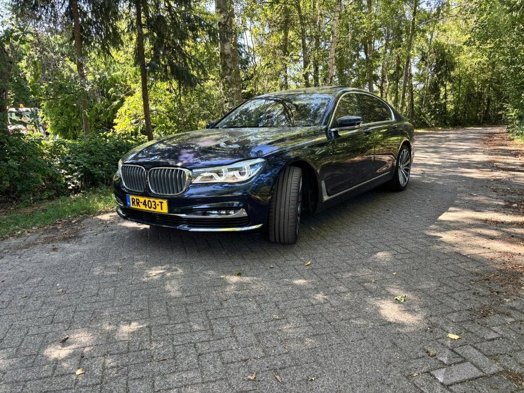 BMW 7-Serie 4.4 750I Xdrive AUT 2015 Blauw 86000 kM., Auto's, Automaat, Bruin, Vierwielaandrijving, Particulier