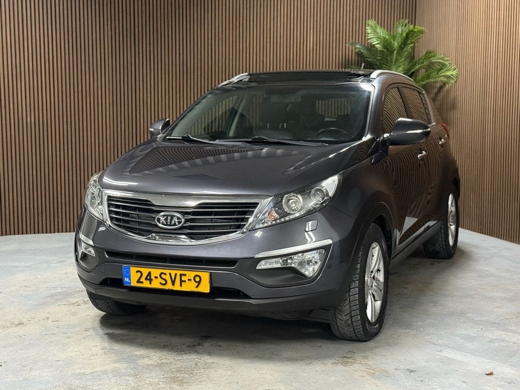Kia Sportage 2.0 X-clusive (bj 2012, automaat), Auto's, Gebruikt, 4 cilinders, 163 pk, 1600 kg