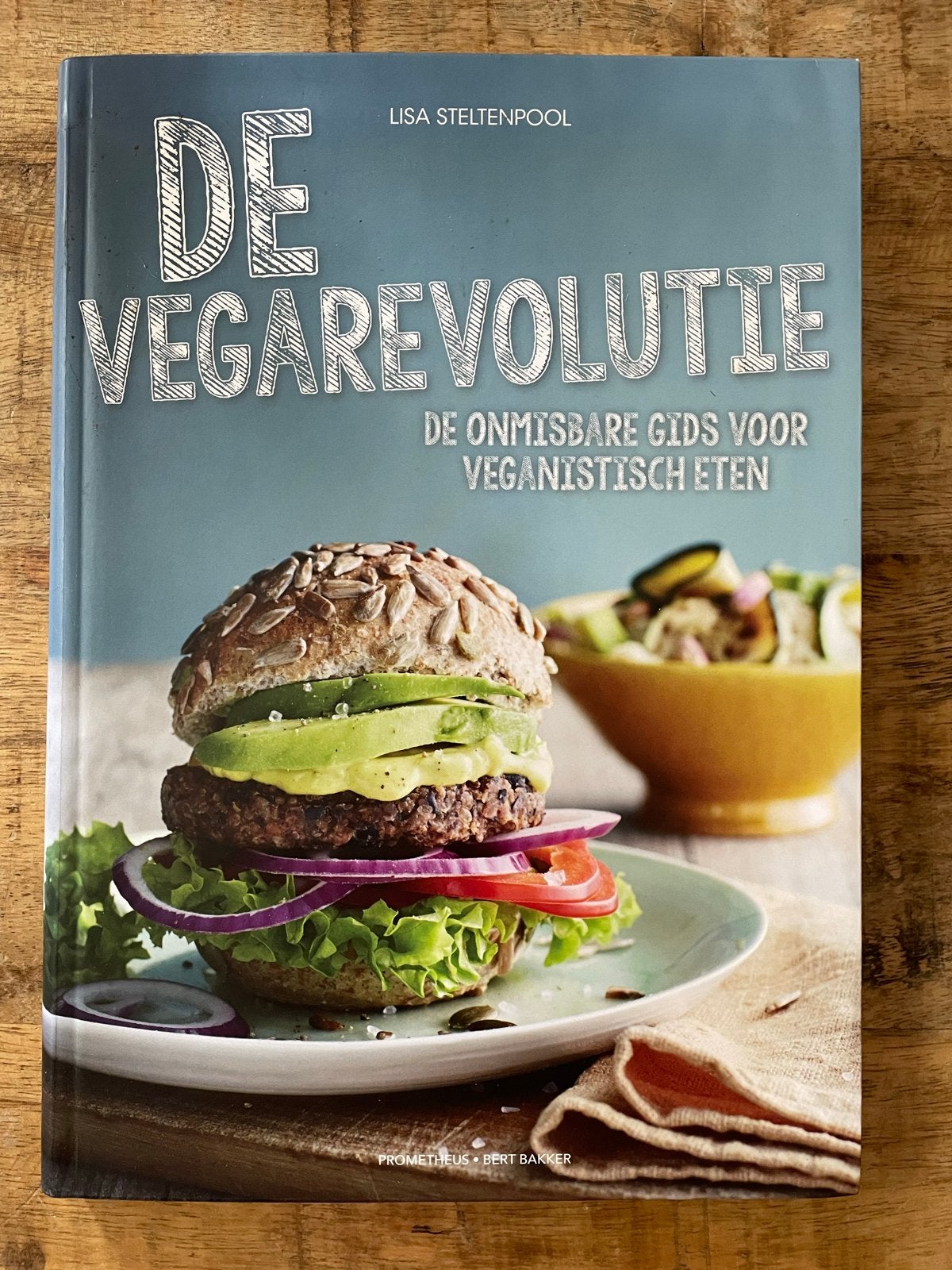 De Vegarevolutie: Gids voor Veganistisch Eten - Lisa Stelten, Hoofdgerechten, Ophalen of Verzenden, Zo goed als nieuw, Gezond koken