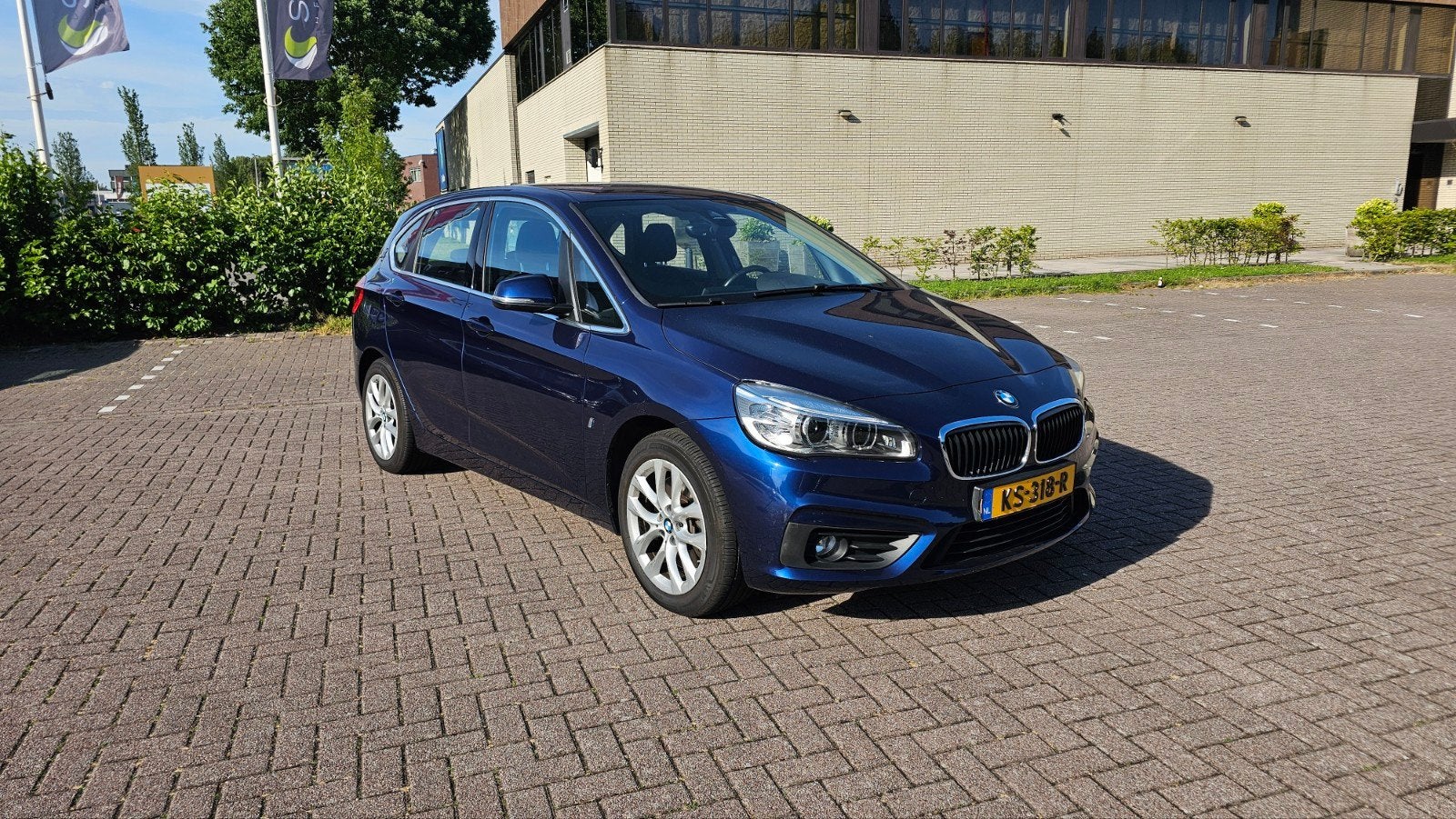BMW 2-Serie Active Tourer 225xe 224pk Aut 2016 Blauw, Auto's, BMW, Automaat, Stof, Blauw, Vierwielaandrijving