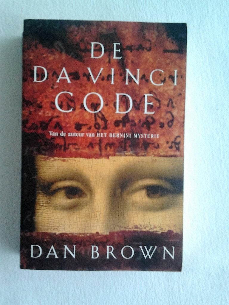 De davinci code. Dan brown paperback, Ophalen of Verzenden, Gelezen