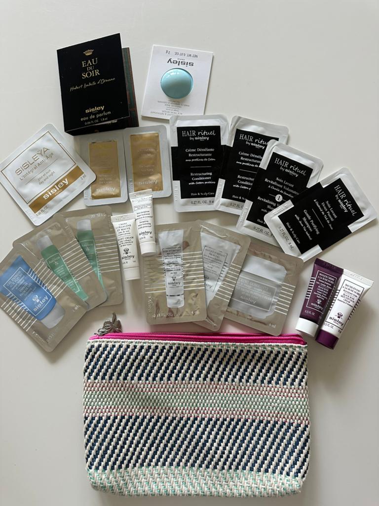Sisley tasje met 19 samples, handig voor vakantie, Ophalen of Verzenden, Zo goed als nieuw, Gehele gezicht