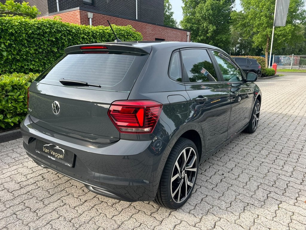 Volkswagen Polo 1.0 MPI airco, stoelverw, sportvelgen, speed, Voorwielaandrijving, Stof, Gebruikt, Zwart