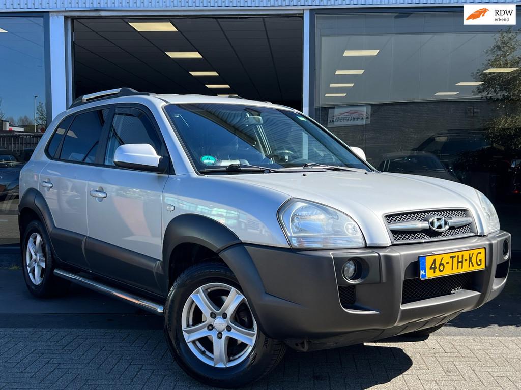 Hyundai Tucson 2.0i Style Premium CRUISE CONTROL/LEDEREN BEK, Auto's, Hyundai, Gebruikt, 4 cilinders, Handgeschakeld, Grijs