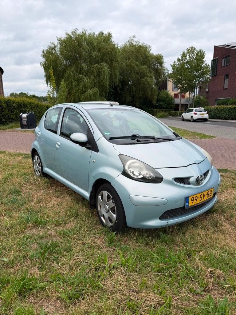 Toyota Aygo 1.0 12V Vvt-i 5DRS 2006 Blauw, Auto's, Voorwielaandrijving, Stof, 68 pk, Origineel Nederlands