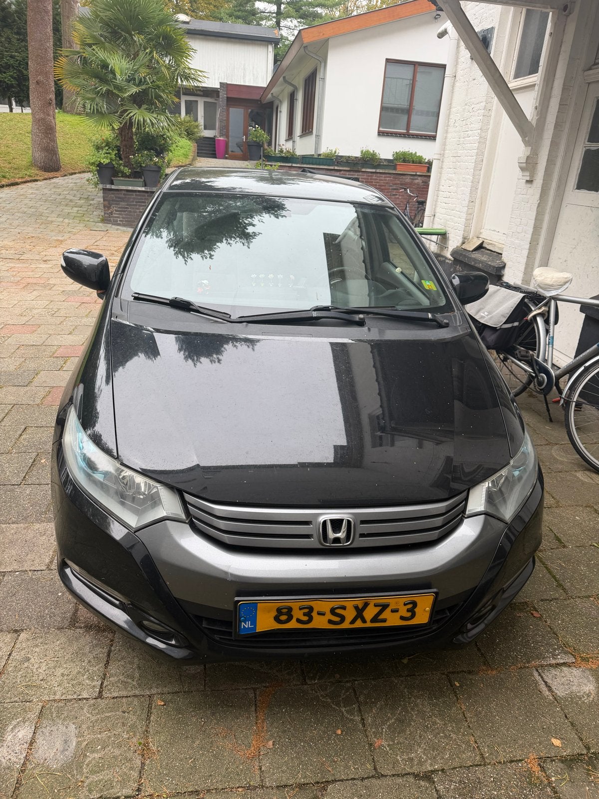 Honda Insight 1.3 Hybrid AUT 2011 Zwart, Auto's, 4 cilinders, Zwart, Origineel Nederlands, 22 km/l