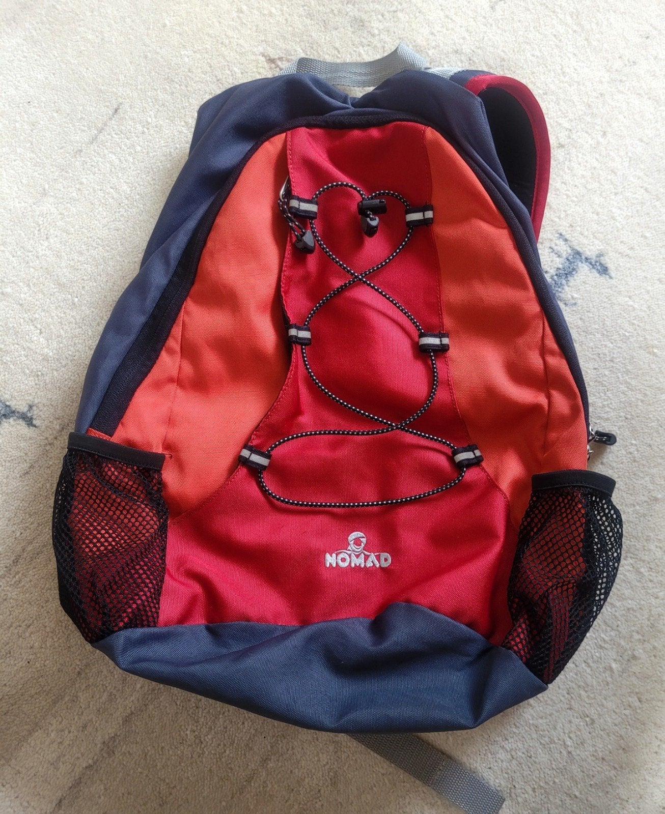 Handzame Nomad rugtas, 20 liter, rood met grijs, Ophalen of Verzenden, Gebruikt, Nomad, 45 tot 60 cm