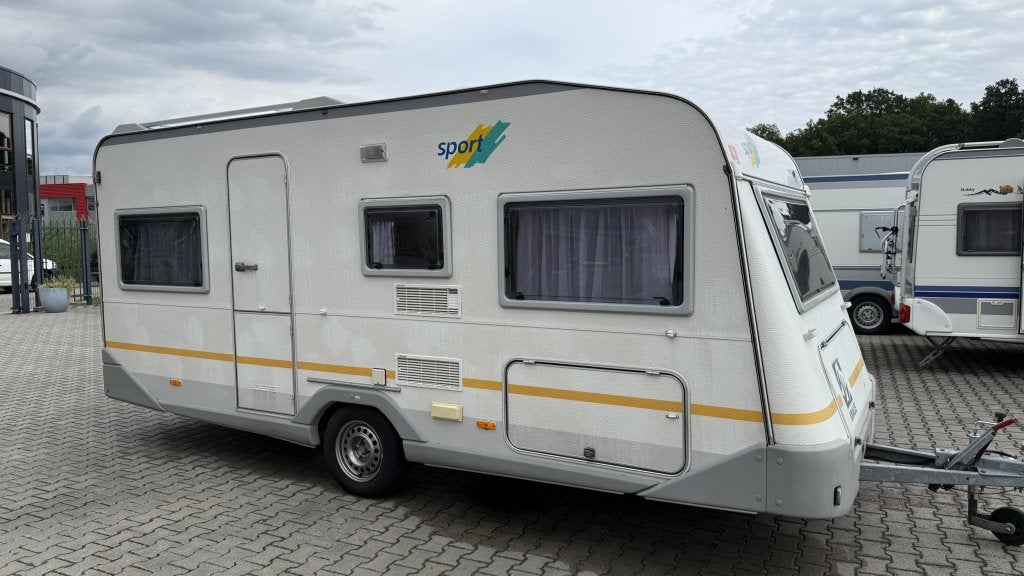 Knaus Sport 485 TU bouwjaar 1996 met voortent en luifel, Schokbreker, Rondzit, Bedrijf, 4 tot 5 meter