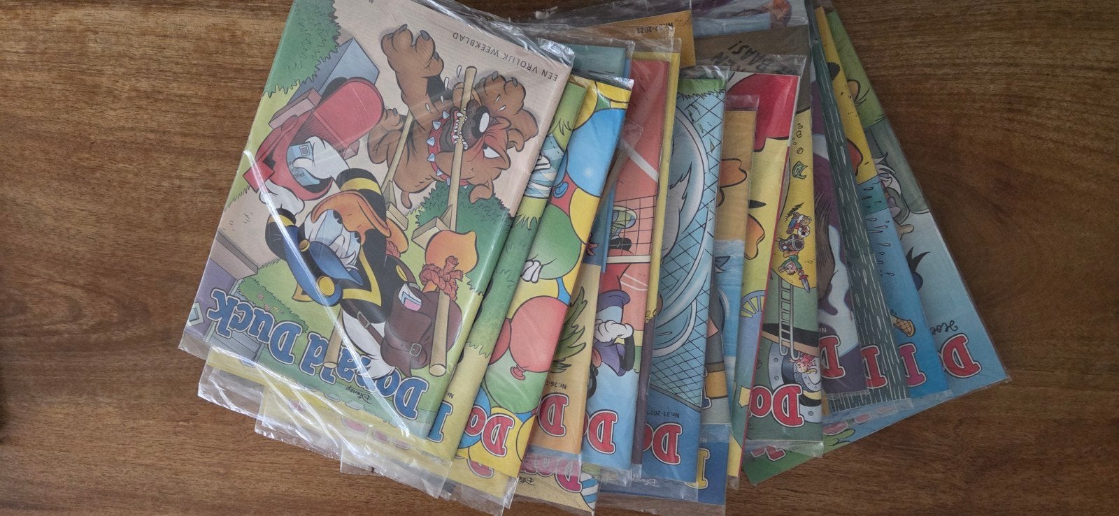 Donald Duck weekbladen 2021 (22 stuks) in folie, Boeken, Meerdere stripboeken, Ophalen, Nieuw, Walt Disney  Donald duck