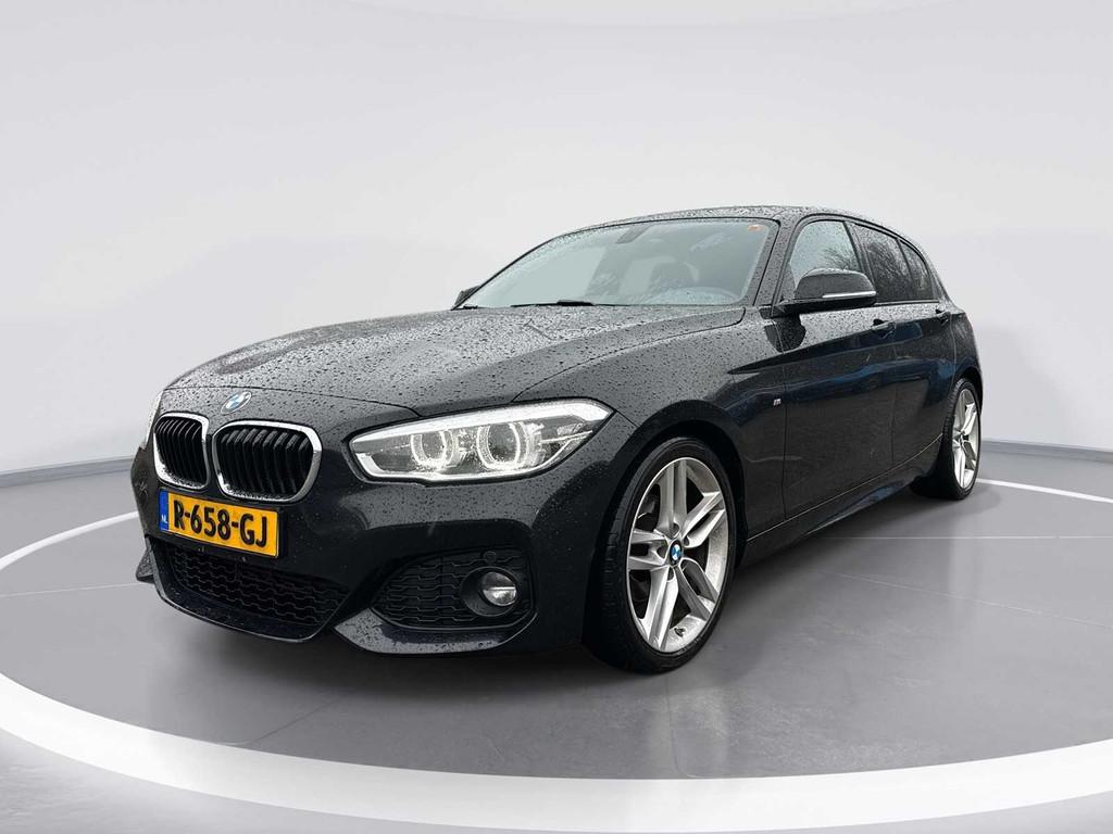 BMW 1-serie 118i High Executive M-Sport 2017 | R-658-GJ, Auto's, BMW, Gebruikt, Zwart, 650 kg, 19 km/l
