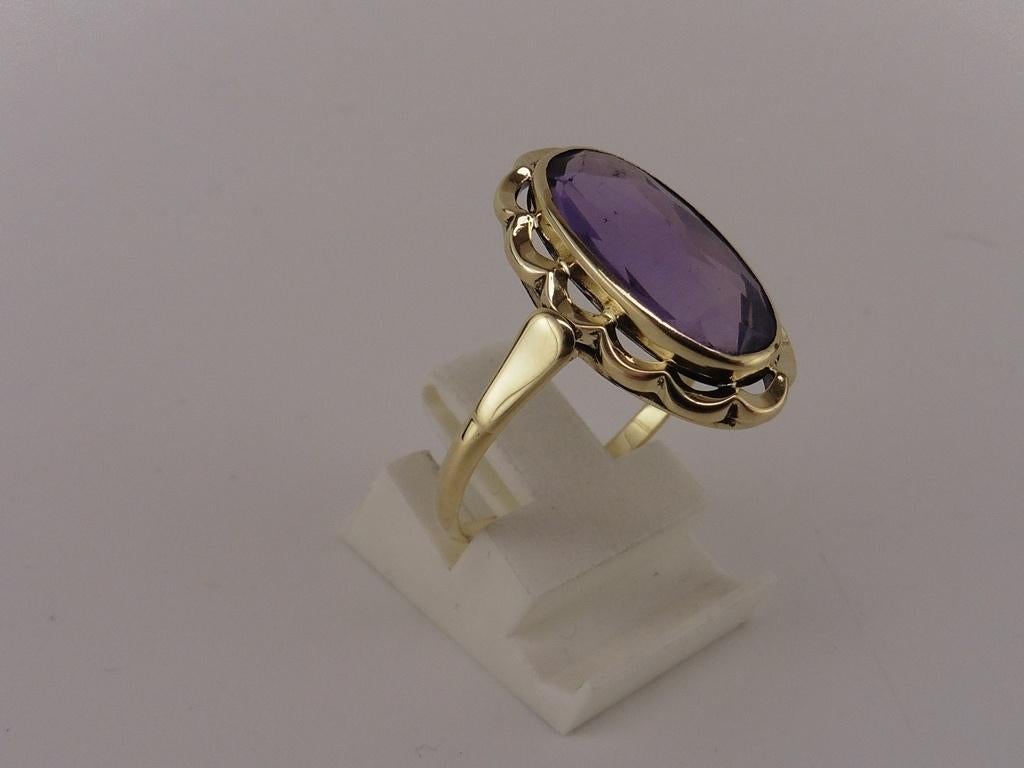 Gouden damesring met amethist                            G12, 18 tot 19, Gebruikt, ., Paars