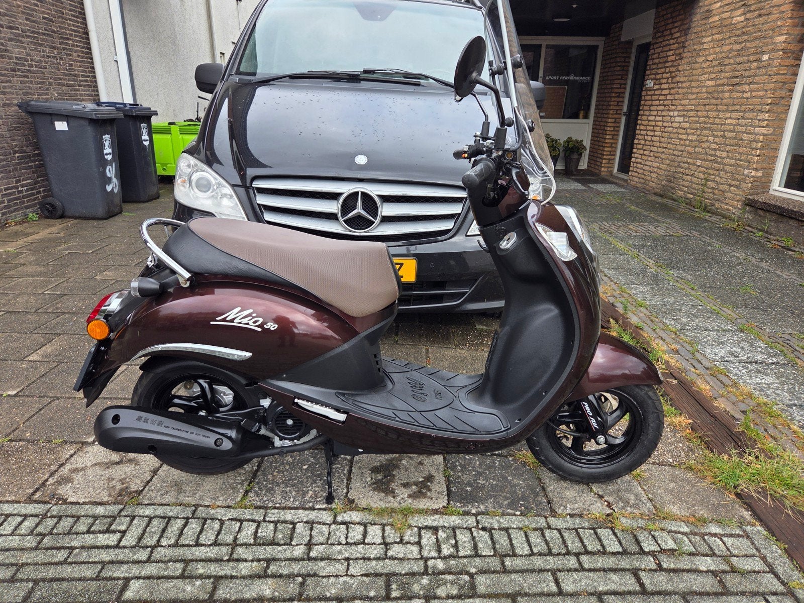 zeer nette gebruikte Sym mio 25 km, Fietsen en Brommers, Scooters | SYM, Mio, Ophalen of Verzenden, Zo goed als nieuw, Benzine