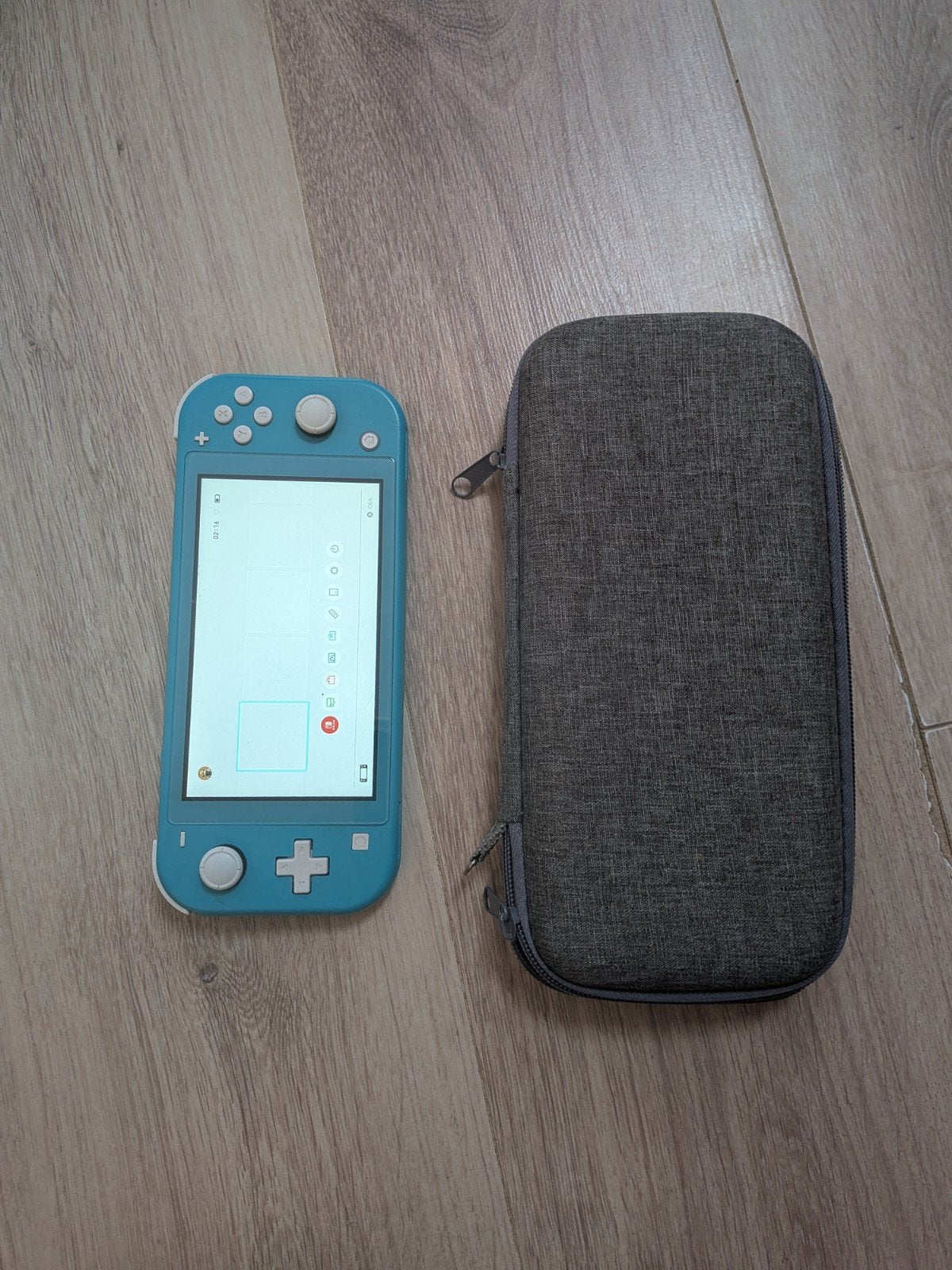 Nintendo Switch Lite Turquoise met opbergtas, Spelcomputers en Games, Spelcomputers | Nintendo Switch Lite, Ophalen of Verzenden