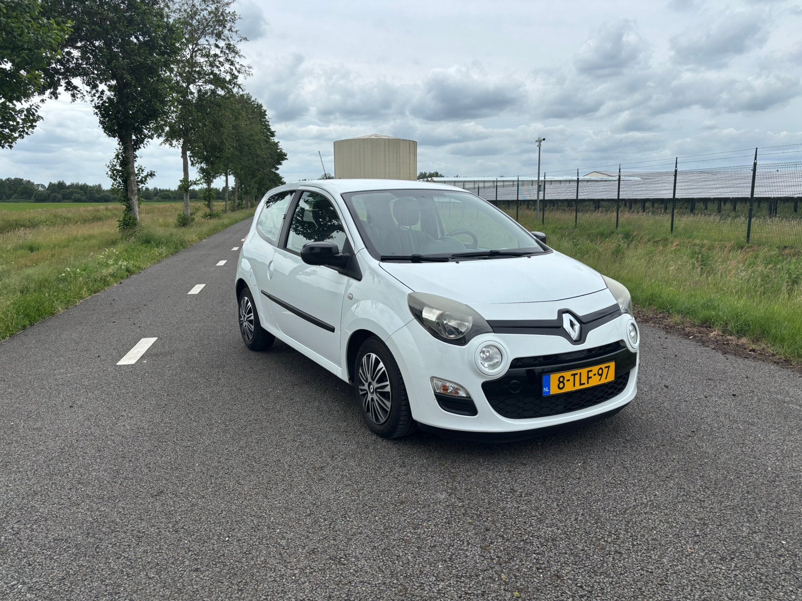 Renault Twingo 1.2 16v 75pk 2014 Wit Bluetooth NAP, Voorwielaandrijving, 74 pk, 4 cilinders, 4 stoelen