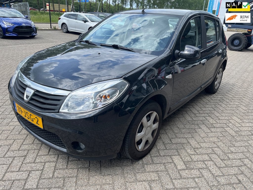 Dacia Sandero 1.2 Lauréate RIJDGOED/AIRCO/NLAUTO!/APK, Auto's, Dacia, Voorwielaandrijving, Stof, Gebruikt, Zwart