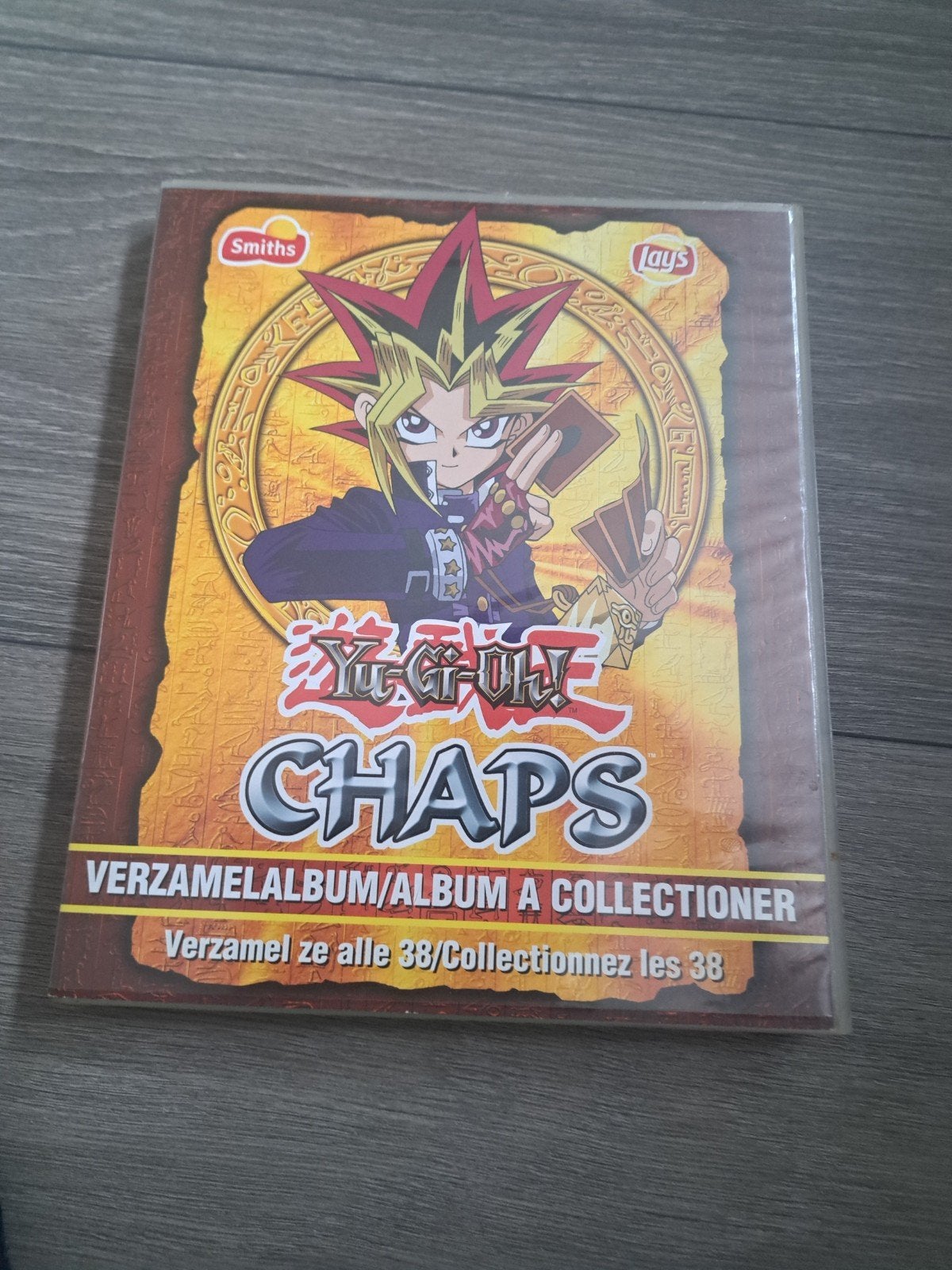 Yu-Gi-Oh! CHAPS verzamelalbum met 38 CHAPS, Hobby en Vrije tijd, Ophalen, Zo goed als nieuw, Boek of Catalogus