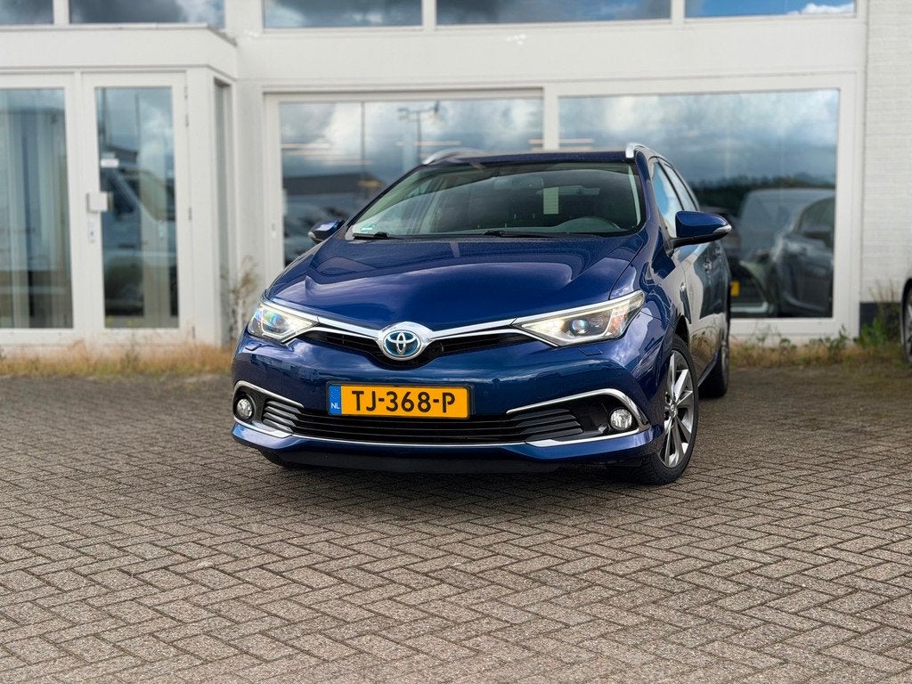 Toyota Auris Touring Sports 1.8 Hybrid Executive, Auto's, Toyota, Gebruikt, Euro 6, Blauw, Grijs
