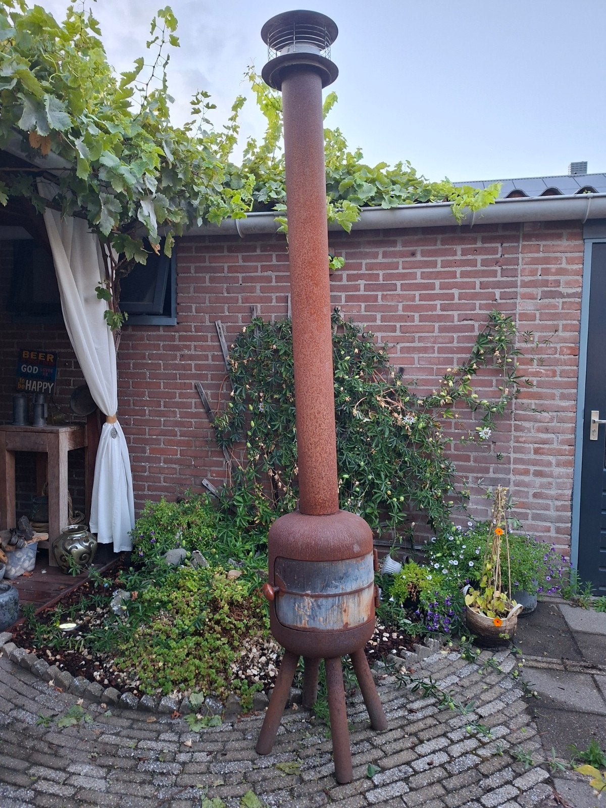 tuinkachel, tuinhaard, buitenhaard, Ophalen