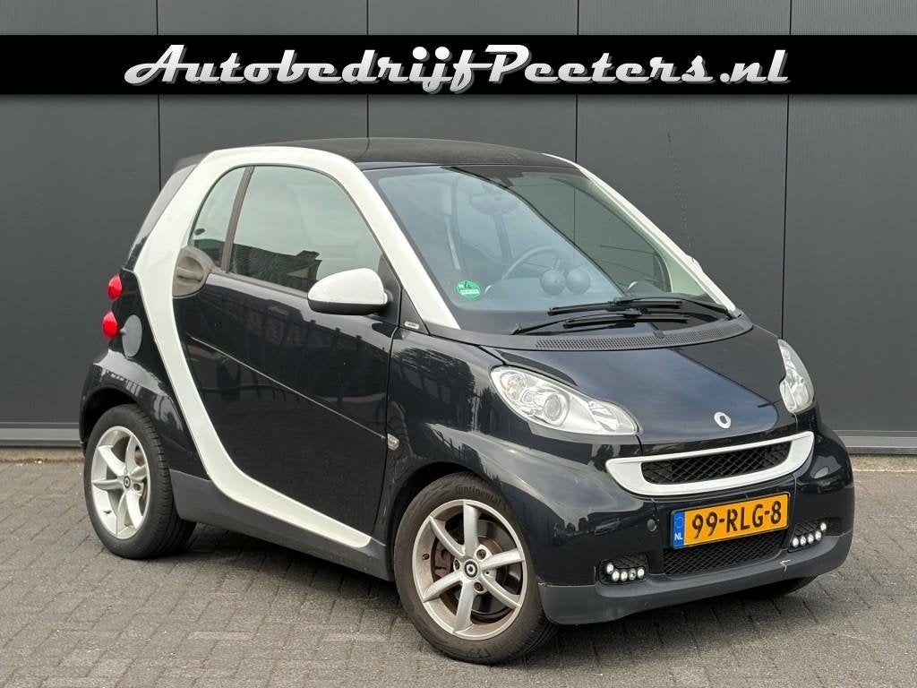 Smart FORTWO 1.0 mhd Panoramadak Airco Navigatie NL-auto, Auto's, Automaat, Euro 5, Achterwielaandrijving, Gebruikt
