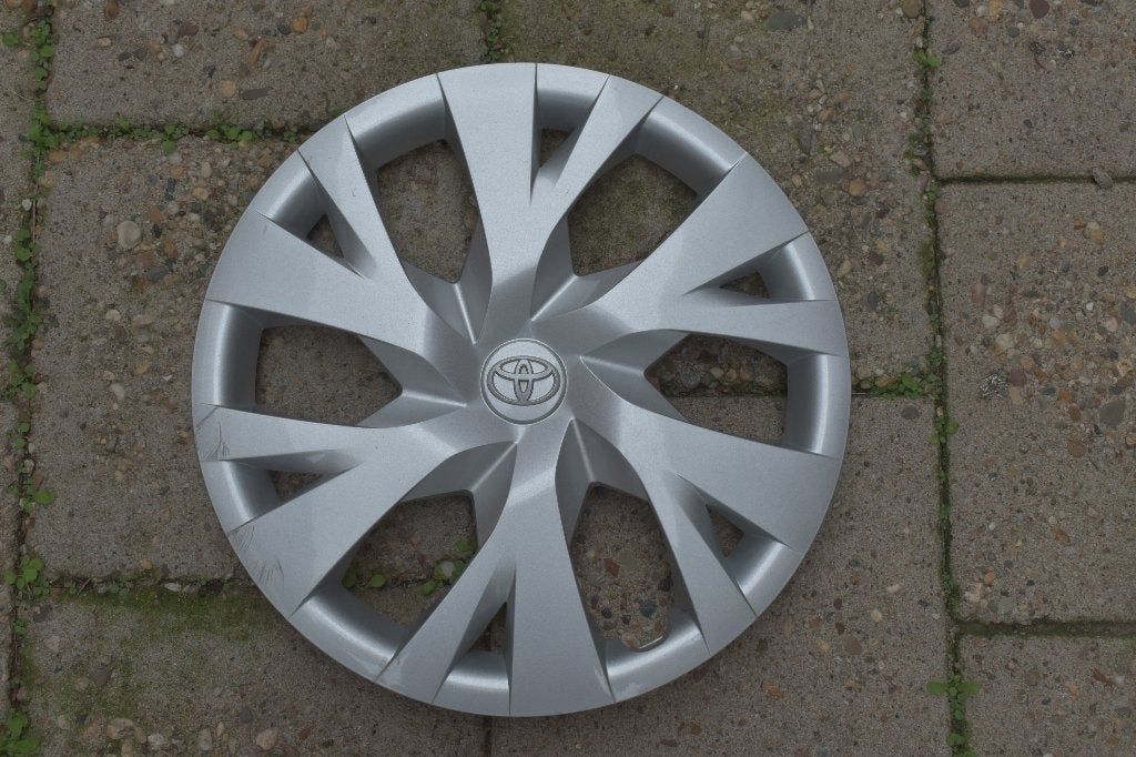 1 losse originele wieldop Toyota Yaris 15 inch (Model 4, Ophalen of Verzenden, Gebruikt