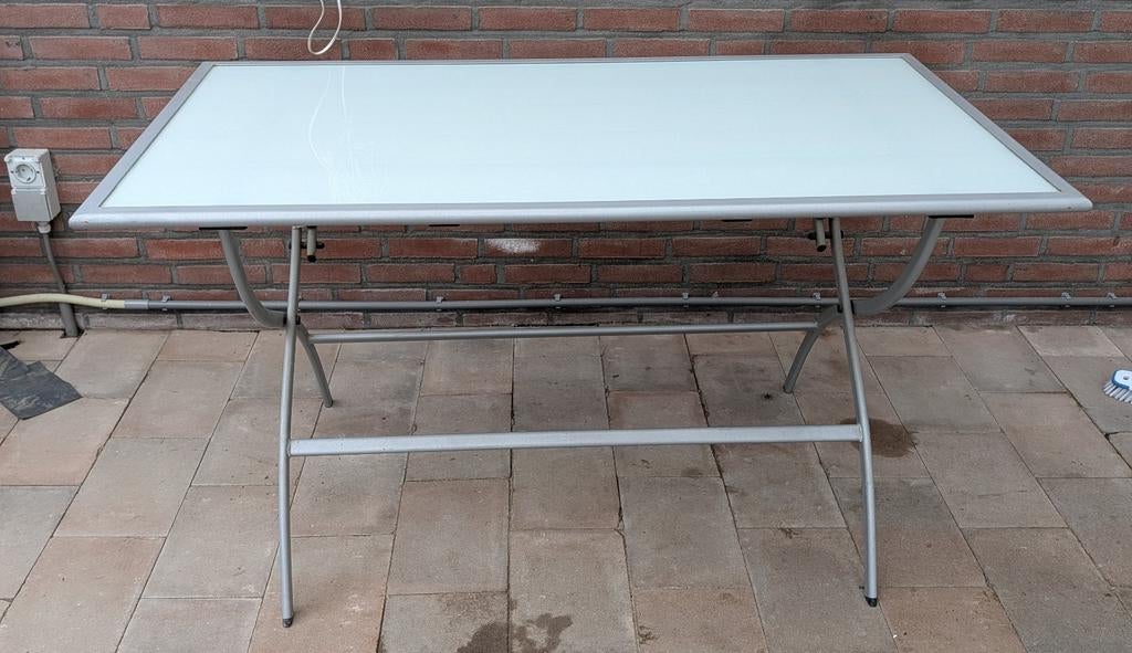 Inklapbare tafel met metalen frame en glasplaat, Ophalen, Gebruikt, 100 tot 150 cm, 50 tot 100 cm