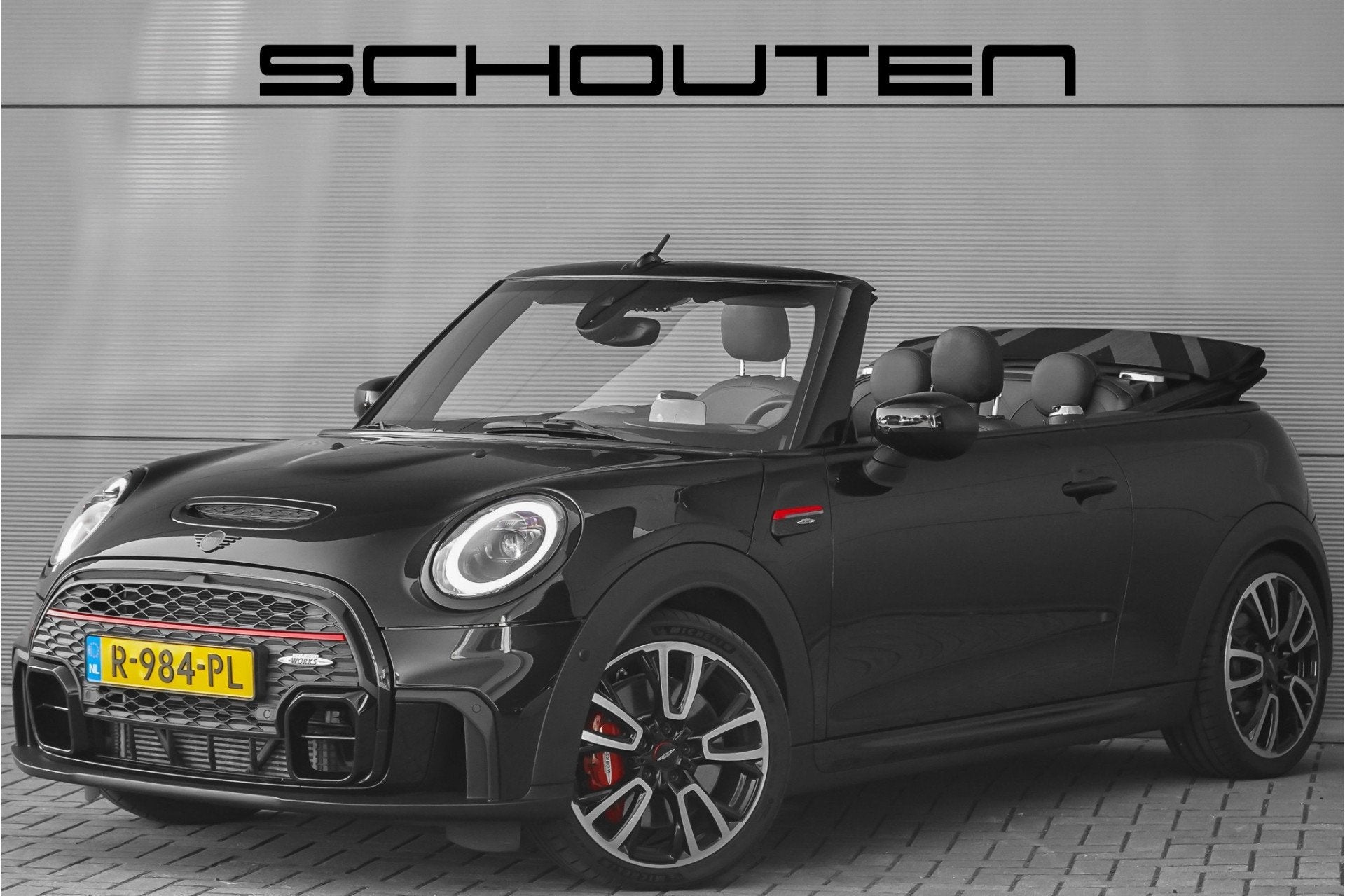 MINI Cabrio 2.0 John Cooper Works HUD H&K ACC Stuurwielverw, Auto's, 232 pk, Gebruikt, 4 stoelen, Zwart
